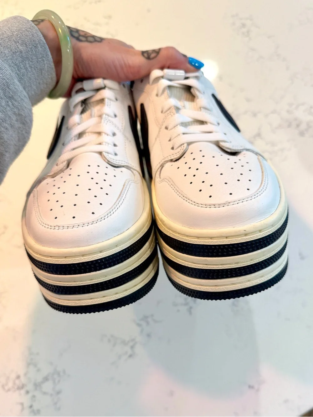 nike women’s air jordan 1 triple stack platform sneakers 9